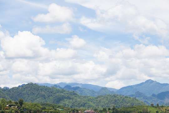 Fototapeta Forest-covered mountains around