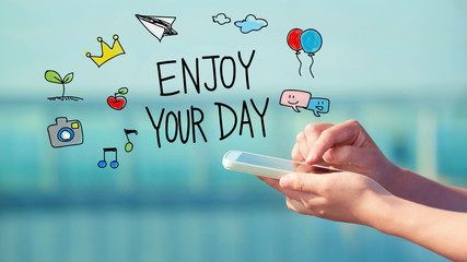 Enjoy Your Day concept with smartphone