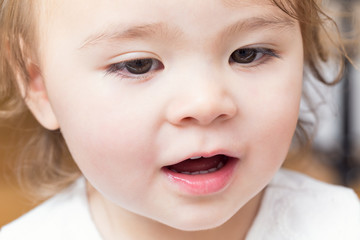 Close-up of a happy toddler girl