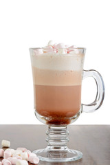 A glass of hot chocolate with marshmallows