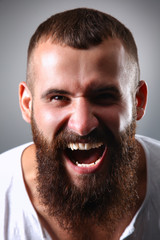 Obraz premium Portrait of handsome man standing, isolated on grey background