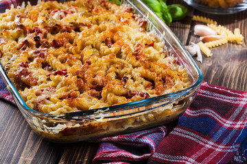 Casserole fusilli pasta with sausage, zucchini and cheese