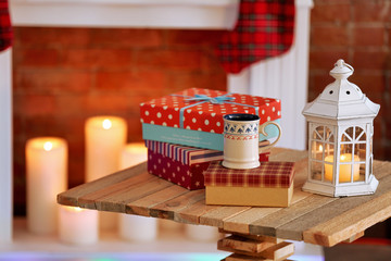 Fireplace with beautiful Christmas decorations in comfortable living room