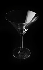 Empty glass on black background