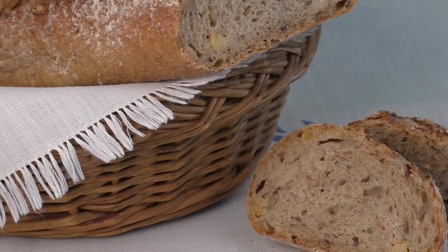 Rustic bread in the bakery basket with napkin
