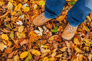 man feet on leaves