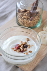 Fototapeta na wymiar granola on top of yogurt bowl
