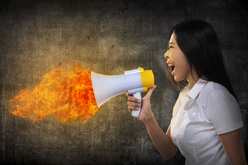 Asian Woman Shouting Megaphone On Fire