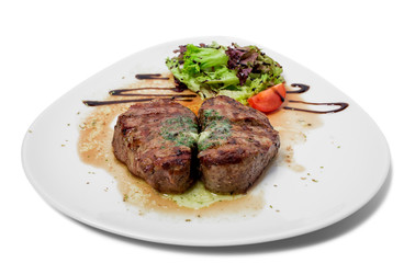 Grilled steak with green butter.