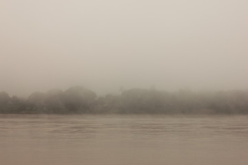 River covered by mist in the morning.