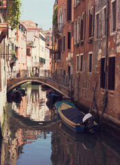 Fototapeta premium Canal in Venice, Italy. Toned image.