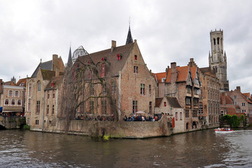 Fototapeta na wymiar The main part of old town during a cloudy raining day in Bruges