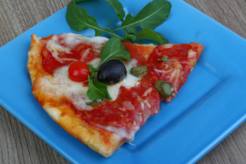 Pizza with salami and mozzarella