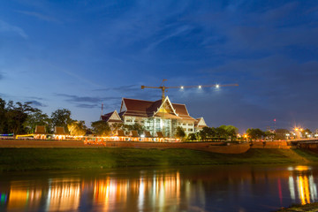 Beautiful of lighting with Buildings at dusk Nan River Thailand