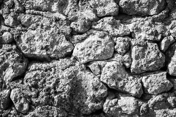 Fragment of stone texture wall or fence for natural background.