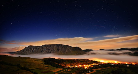 beautiful mountain landscape in foggy morning in Alba, Romania