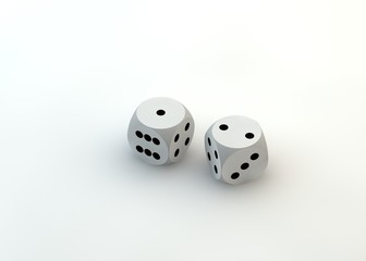 Two white dice thrown to reveal the values two and one