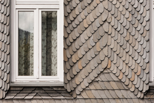 Handwerkskunst - Aufwendige Hausverkleidung mit Schiefer