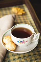 Cup of tea with cookies, vintage style