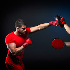 Fototapeta na wymiar personal trainer man coach and man exercising boxing in the gym