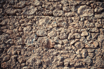 Fragment of stone texture wall or fence for natural background.