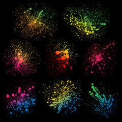 Set of 8 isolated colorful gradient rainbow grunge paint splashes on black background
