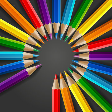 Circle of rainbow colored pencils with realistic shadow on dark grey background