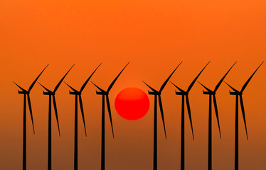 silhouette wind turbines generating electricity 