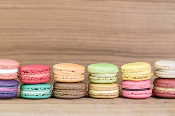 Stack Focus Image Of Colorful French Macarons On Wooden backgrou