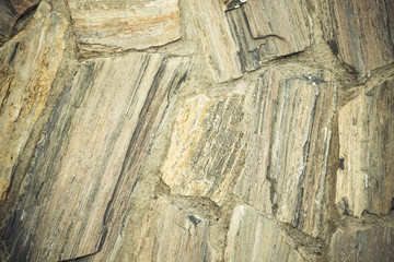 Fragment of stone texture wall or fence for natural background.