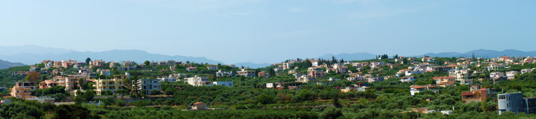 Fototapeta na wymiar Panorama view of the town and mountains.