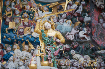 Exterior of the group sculpture "The Last Judgment" above the entrance to the Munster of Bern cathedral in Bern, Switzerland.