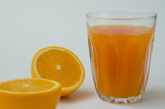 Orange Juice and Sliced Organic Orange.