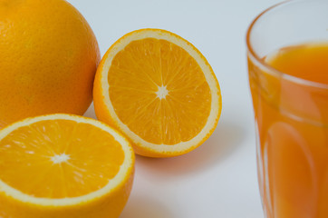 Orange Juice and Sliced Organic Orange.