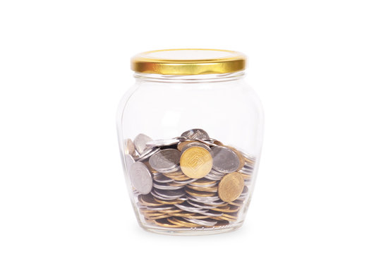 Coins in glass money jar