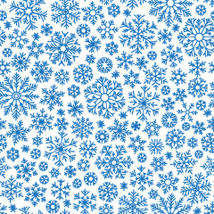 Christmas seamless doodle pattern with snowflakes
