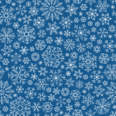 Christmas seamless doodle pattern with snowflakes