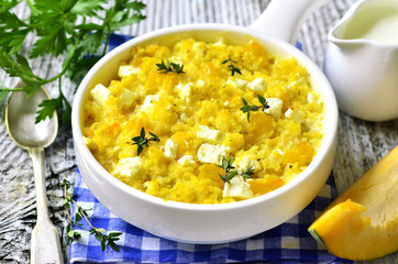 Spicy millet casserole with pumpkin and feta.