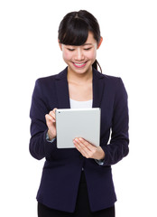 Young Businesswoman use of the digital tablet