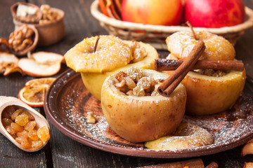 Naklejka na ściany i meble baked apples with raisins and nuts