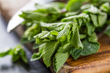 Mint on dark stone background