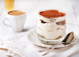 Tiramisu dessert in a glass. Traditional Italian.