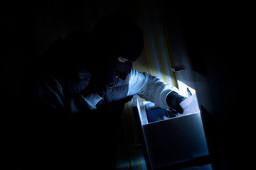 burglar takes confidential documents