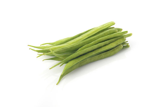 Fresh green cluster beans on white background shot in studio.