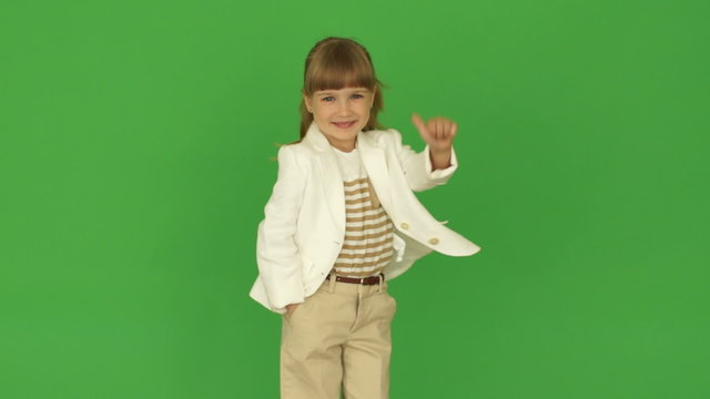 Little business woman standing with ok hand sign