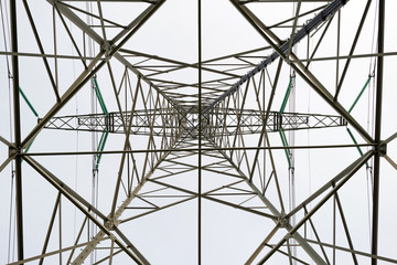 Tower of a power line seen from below