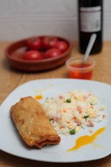 fried rice and spring roll with sweet and sour sauce