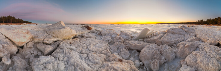 Hummocks on the shore of the Baltic Sea. Winter landscape.