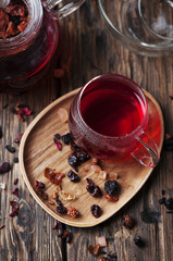 Red hot tea on the wooden table