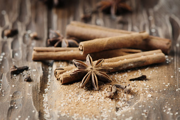 Spices cinnamon and anise on the wooden table